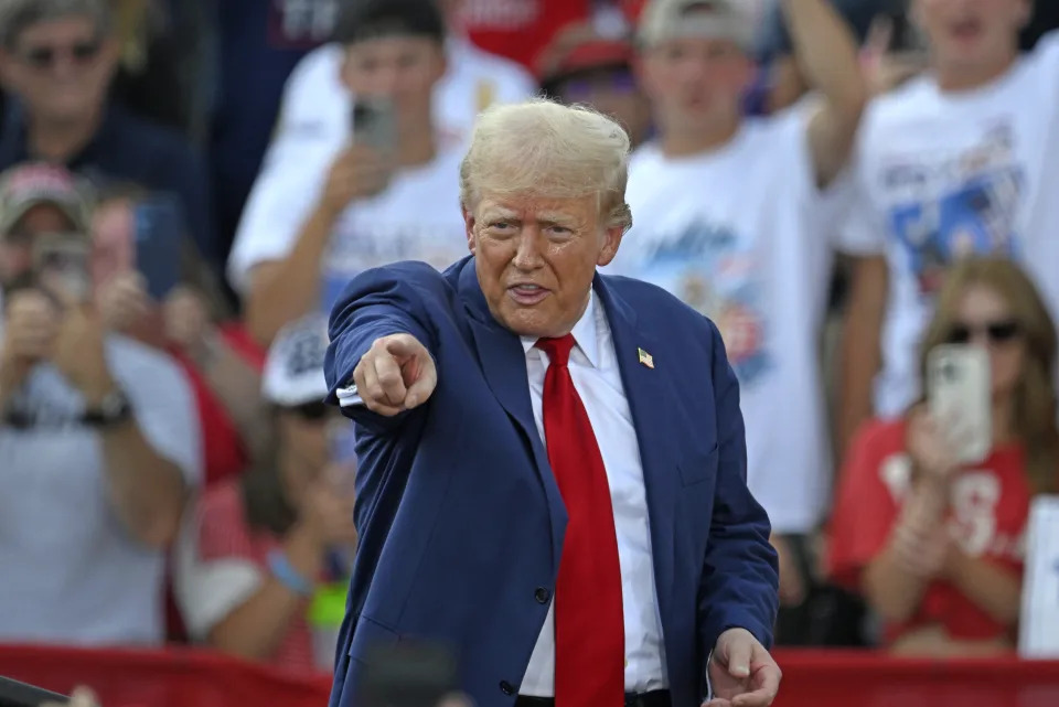 Former US President and Republican presidential candidate Donald Trump gestures during a campaign rally at the North Carolina Aviation Museum & Hall of Fame in Asheboro, North Carolina, on August 21, 2024. (Photo by Peter Zay / AFP) (Photo by PETER ZAY/AFP via Getty Images)