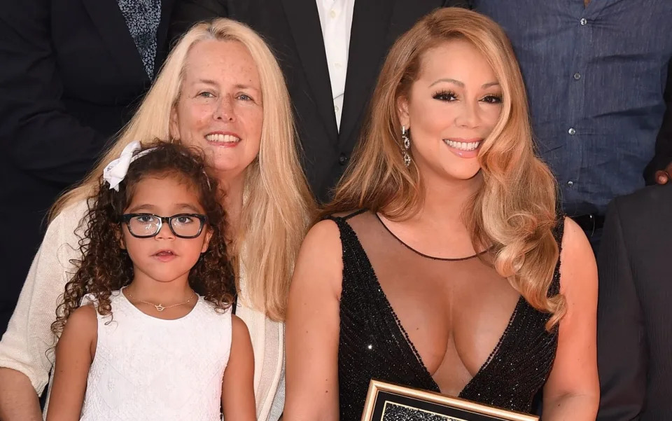 Mariah Carey with her mother Patricia, top left, on the Hollywood Walk of Fame in 2015