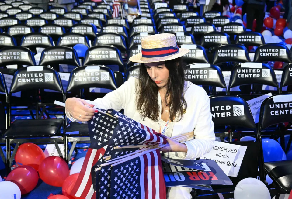 An attendee is garbed in white on the final day of the Democratic National Convention. 